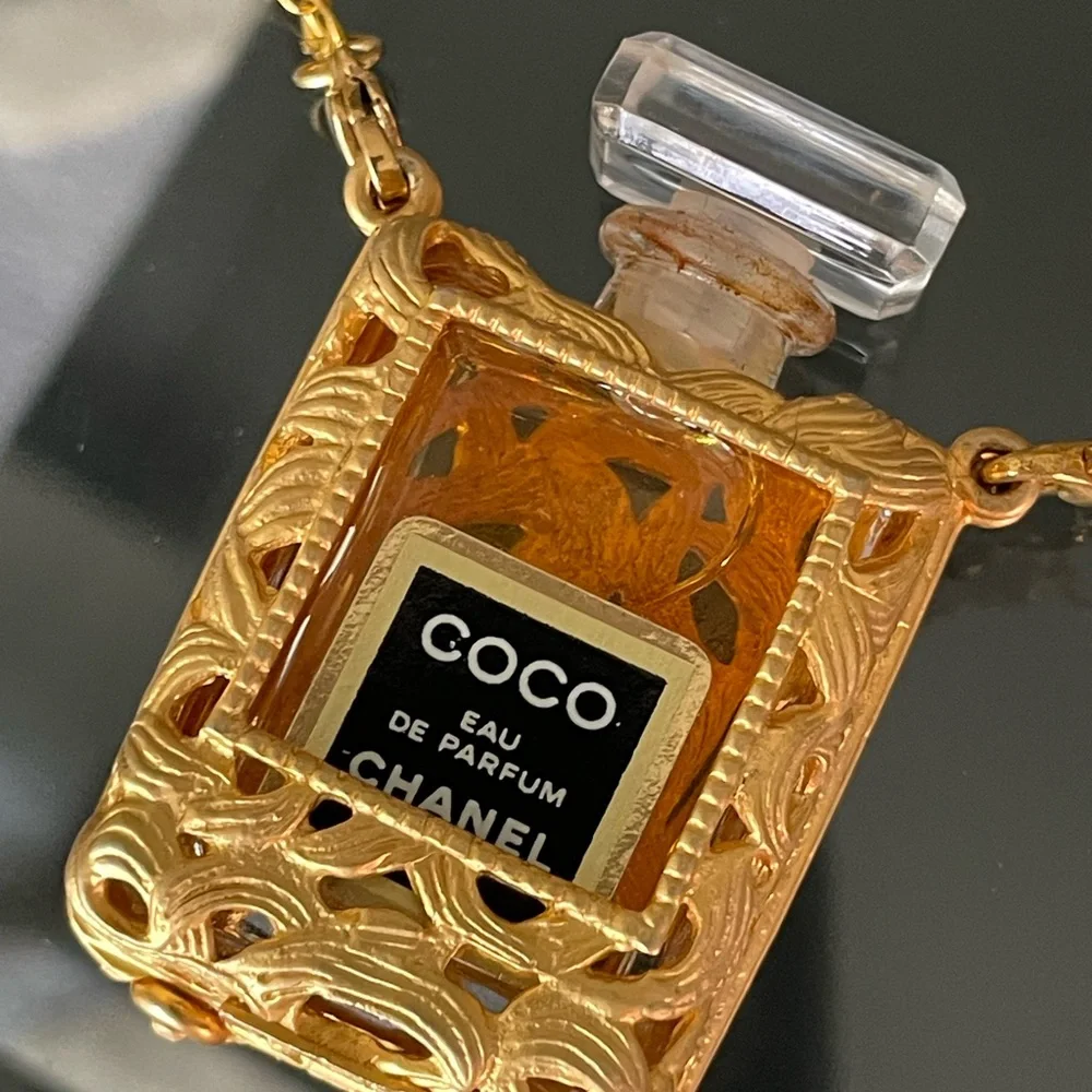 CHANEL Gold Tone Coco Eau de Parfum Bottle Pendant Necklace with coco bottle 18” - Picture 2 of 7